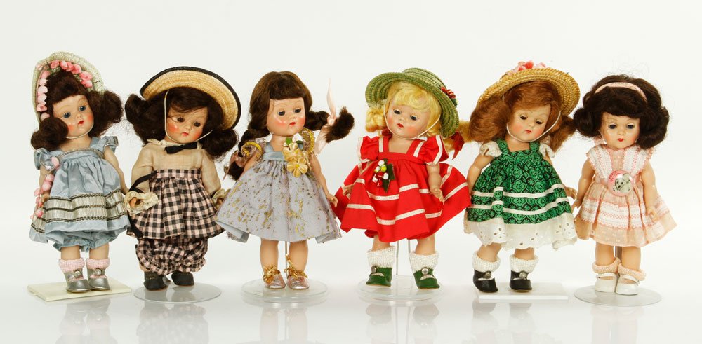 Lot of 6 Vogue Ginny Dolls: Lot of six Vogue Ginny dolls, to include: Beryl, Kinder Crowd #26, Cheryl, doll with green and black eyelet trim dress, doll with pink polka dot dress, and Glad. Provenance: From a Framingham, MA esta