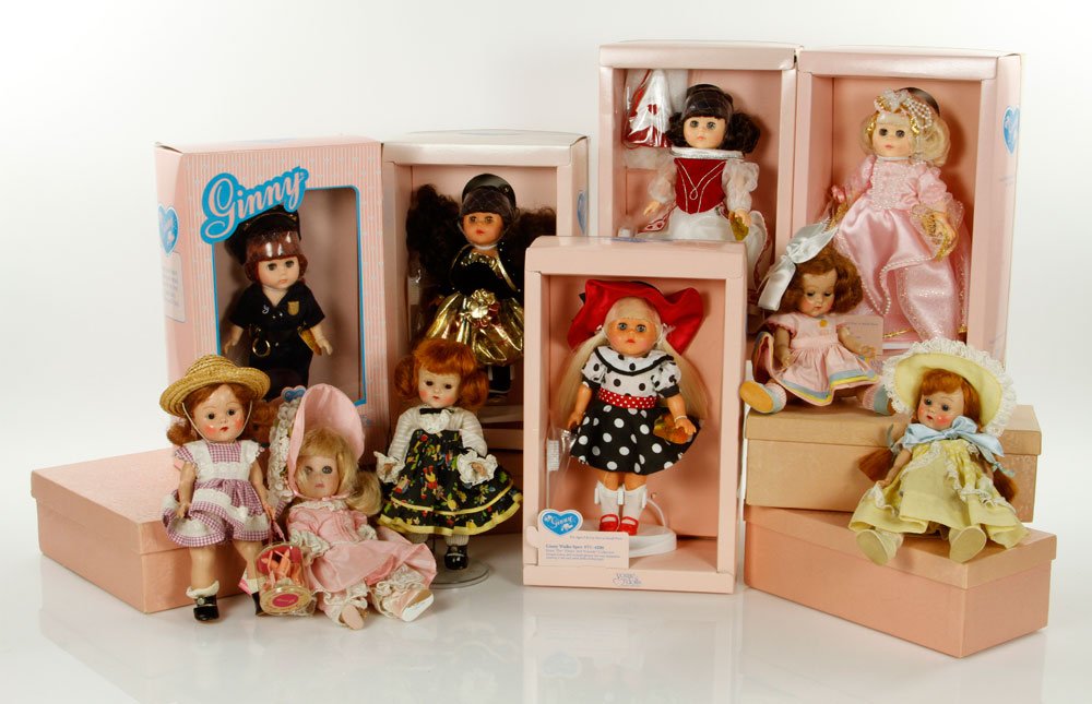 Lot of 10 Vogue Ginny Dolls: Lot of ten Vogue Ginny dolls, to include: doll with pink dress with blue and yellow trim, doll with yellow dress and hat with lace trim, doll with plum and white checkered dress with straw hat, doll w