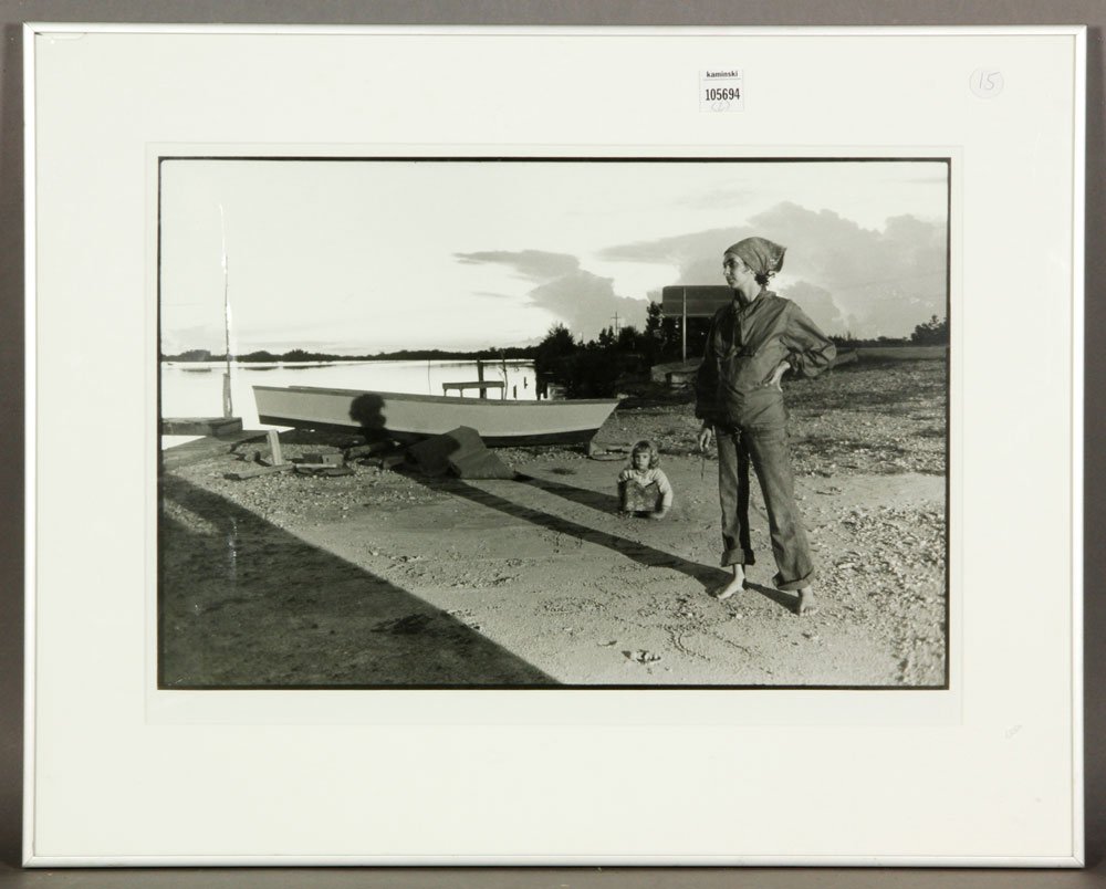 2 Gelatin Silver Prints: Mother and Child and NYC: William Maguire, young mother and child against a water view, gelatin silver print, exhibited at the Art Museum at Florida International University, 12 1/2" x 18 1/2" (view), 20" x 24" (frame); NYC St