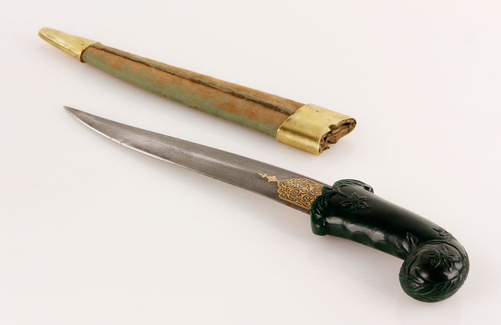 19th C. Mughal Dagger: 19th century, Mughal dagger, north India, inlaid damascus blade with dark green jade hilt, 16". Provenance: NY collection.