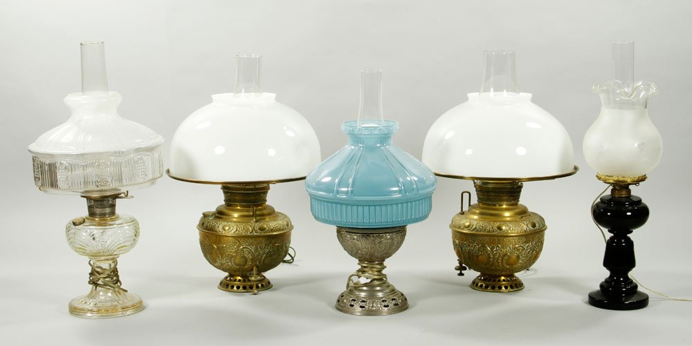5 19th C. Lamps: Lot of five 19th century lamps, electrified, including Miller, chrome, oil lamp, amethyst, two at 22", one at 23"h, one at 21"h, one at 24"h. Provenance: MA estate.