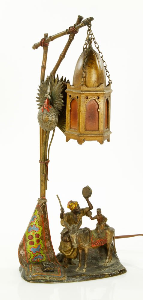 Austrian Cold Painted Bronze Lamp: Austrian lamp, cold painted bronze, of man with monkey riding donkey, signed "Chotka," 15 3/4"h x 6 3/4"w. Provenance: From a CA collector.