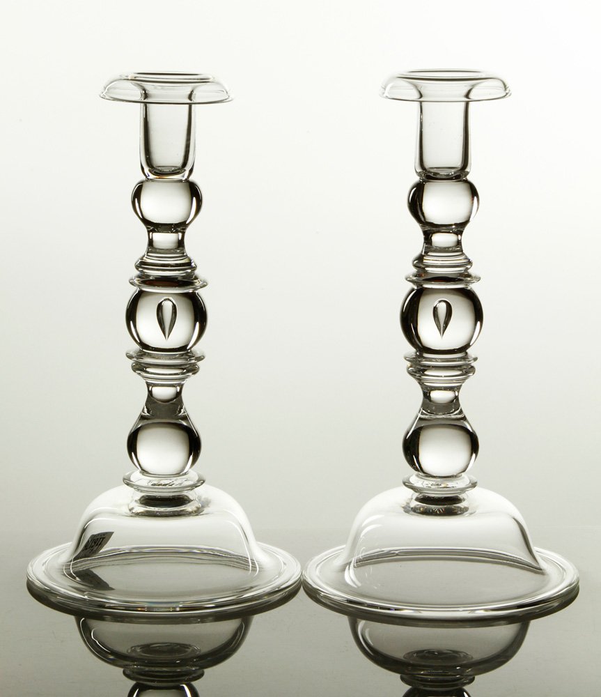 Steuben Glass Baluster Teardrop Candlesticks: Steuben baluster teardrop candlesticks. glass, signed underside, 10 1/2" h x 5 /12" dia. Provenance: From a New Hampshire collection.