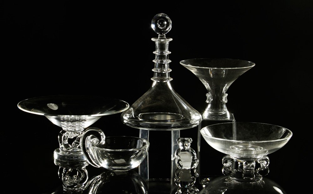 Lot of 6 Steuben Pieces: Lot of six Steuben glass pieces, to include: thumbprint pedestal compote, 5" h x 7" dia; pedestal bowl with scrolled foot, # 7884, 5" h x 10" dia; low footed bowl, 3" h x 8" dia; decanter with stopper