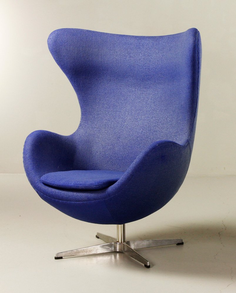 "Egg Chair," in the Style of Jacobsen/Hansen: "Egg Chair," in the style of Arne Jacobsen for Fritz Hansen, blue wool upholstery, on aluminum swivel base, 41" h x 34" w x 24 "d. Provenance: From a California estate.