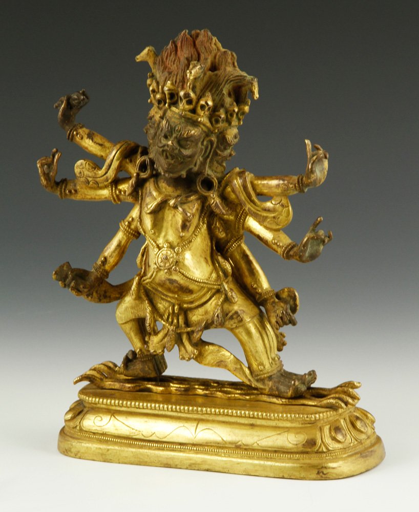 Sino-Tibetan Gilt Bronze Figure: Sino-Tibetan gilt bronze figure of a Buddhist deity, Qing Dynasty, 7 1/2"h x 5 1/2"w.