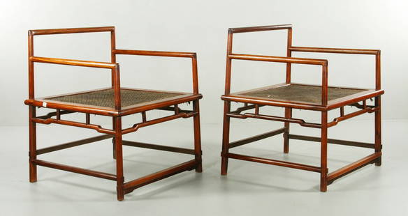 Pr. Chinese Huanghuali Wood Chairs: Pair of huanghuali wood chairs, China, Ming Dynasty, square shape, with cane surface, 28 1/2"h x 36"w x 32"d.