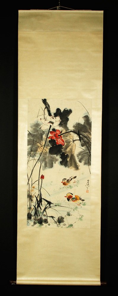 Chinese Scroll W/C: Scroll watercolor painting, China, of two Mandarin ducks in a pond with flowers, signed Wang Xuetao, 36"h x 17 1/2"w.