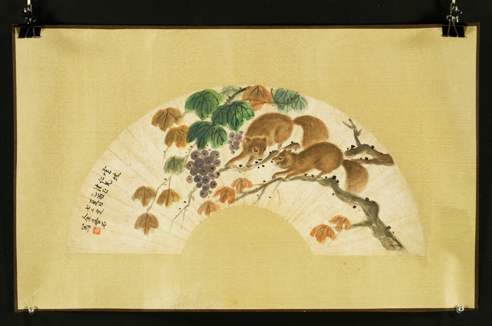 Chinese Fan Shaped W/C: Fan shaped watercolor painting on paper, China, of two squirrels in berry branches, signed, 10"h x 21 1/2"w.