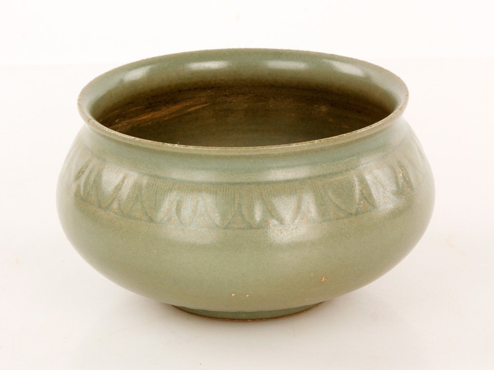 Antique Chinese Green Glazed Porcelain Censer: Antique green glazed porcelain censer, China, round form, incised with lotus in center, with flower petal patterns around shoulder and base, 3 1/4"h x 6"w.