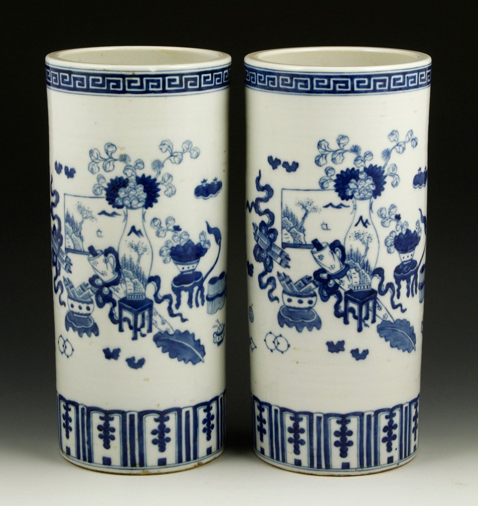 Pr. Blue and White Hat Stand Vases: Pair of blue and white porcelain hat stand vases, China, painted with vases, screen, scrolls, books, and stools, Guangxu mark on base, 11 1/4"h.