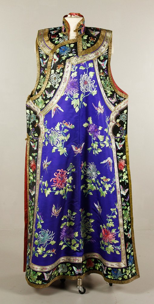 Chinese Early 20th C. Robe: Women's silk robe, China, early 20th century, royal blue with black border, decorated with butterflies and flowers, 58" h x 40" w. Provenance: Gift from a patient of Dr. Norman T. Kirk, Chief of Surgi