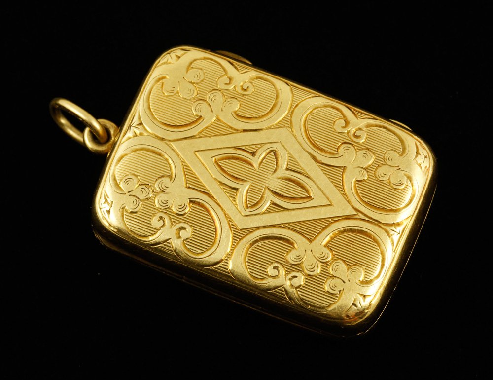 14K Gold Box: 14k yellow gold box, stamped Tiffany and Co. on ring, monogrammed, 1 1/4" h x 7/8" w, approximately 11 g. TW. Provenance: From a Martha's Vineyard Estate.