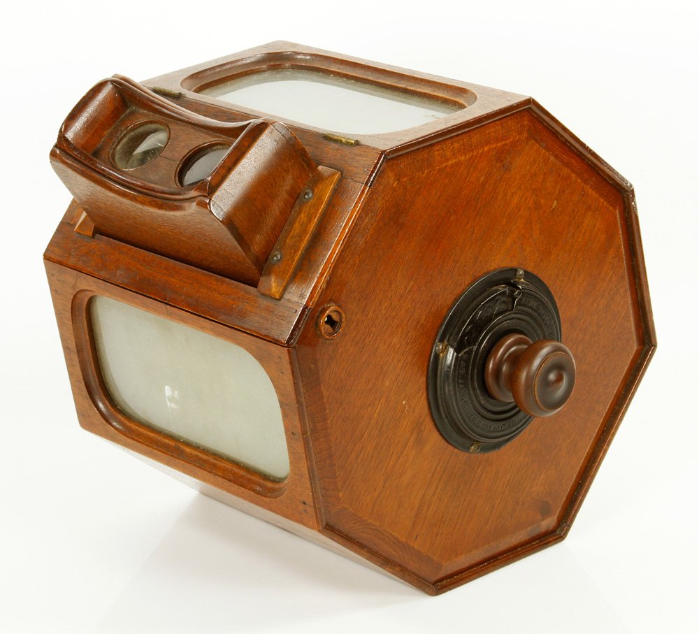 1874 Caldwell Sweetheart Viewer: J. W. Caldwell octagonal sweetheart viewer, 1874, made in North Reading, MA, with full lot of stereo views, approximately sixty total, 13 1/2" h x 10 1/4" w x 11 1/2" d. Provenance: MA collection.