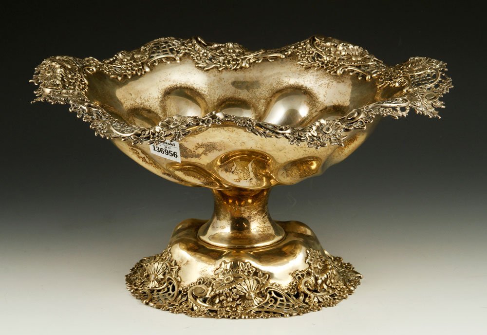Black Starr and Frost Sterling Center Bowl: Black Starr and Frost center bowl, sterling silver, with pierced floral edge, approximately 33.5 troy ounces TW, 7" h x 13 5/8" dia. Provenance: From a New York estate.
