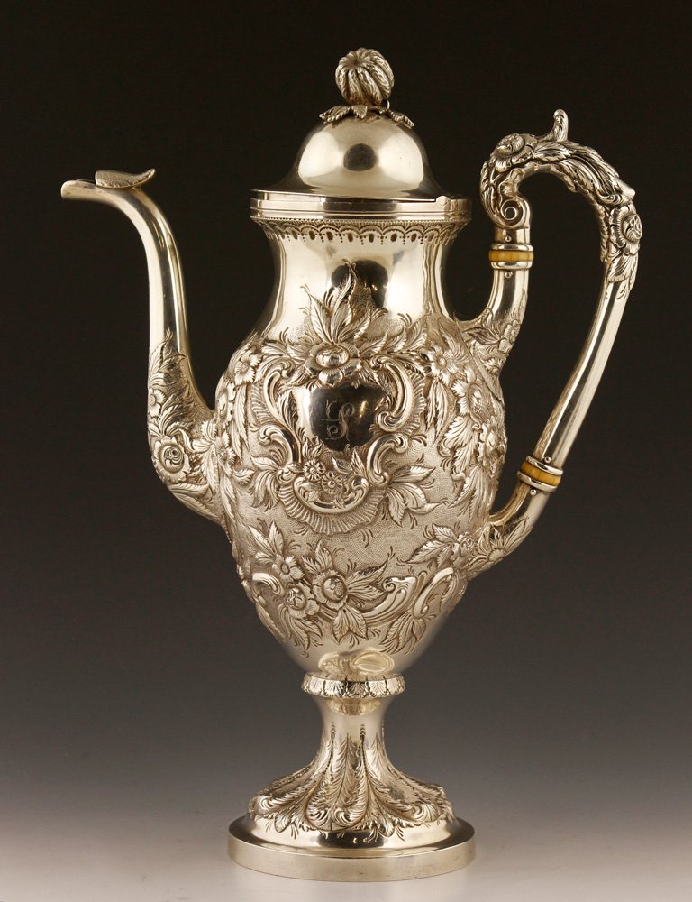 Late 18th/Early 19th C. Sterling Silver Coffee Pot: Late 18th/early 19th century coffee pot, sterling silver, A. E. Warner, Baltimore, MD, with repousse rose and acorn design and gourd finial, approximately 37 troy oz TW, 14"h. Provenance: From a Massa