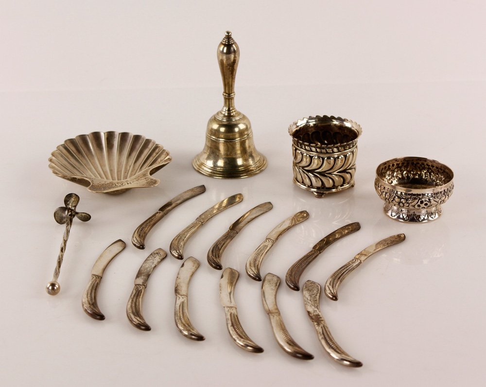 Lot of Tiffany Sterling: Lot of Tiffany sterling silver, to include: twelve knives marked "M" for Edward Moore, 4 3/8" l; dinner bell, marked "Tiffany and Co. Makers" 4 1/4" h x 2 1/4" dia; toothpick holder, marked "M" for Ed