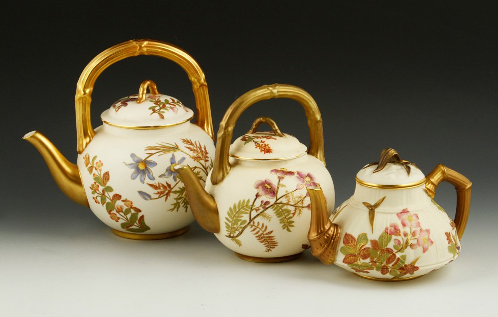Collection of 3 Royal Worcester Blush Ivory Teapots: Collection of three Royal Worcester blush ivory teapots, porcelain, all with puce marks, tallest 8 1/2" h, smallest 5". Provenance: From a NY estate.