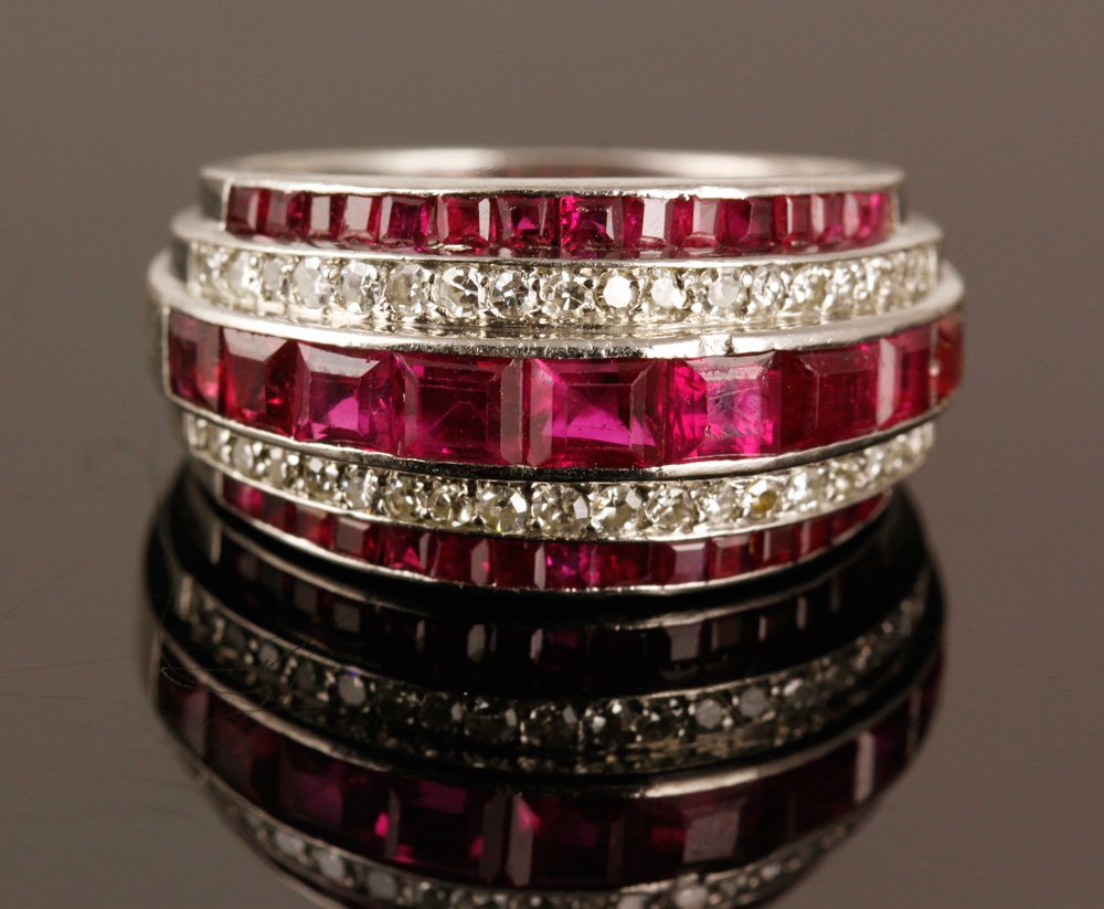 Platinum Diamond and Ruby Ring: Platinum, diamond, and ruby ring, approximately 12 g. TW, size 5 1/2. Provenance: From a NY collection.