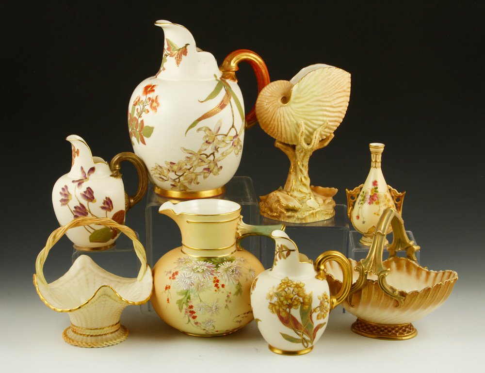 Collection of 8 Pieces of Royal Worcester Blush Ivory: Collection of eight pieces of Royal Worcester blush ivory, porcelain, to include: pitchers, baskets, and vases including a nautilus vase, seven with puce marks, one (smallest) with green mark, tallest