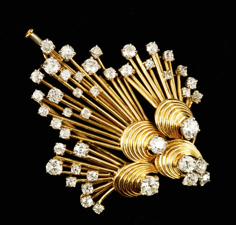 18K Diamond "Chaumet" Paris Brooch: 18K yellow gold and diamond "Chaumet" Paris brooch, approximately 15 g. TW, 1 7/8" x 1 1/2". Provenance: From a NY collection.