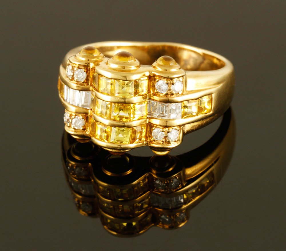 14K Diamond and Yellow Sapphire Ring: 14K yellow gold, diamond, and yellow sapphire ring, fourteen diamonds and thirteen sapphires all channel set, made by Levian, approximately 8 g. TW, size 8. Provenance: From a MA estate.