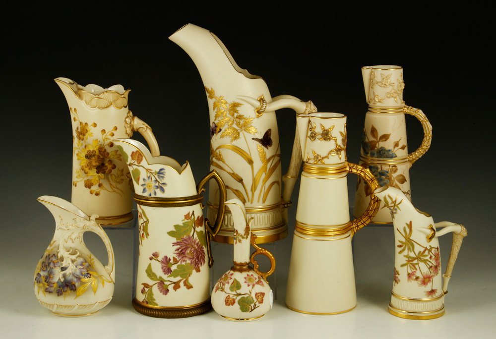 Collection of 8 Royal Worcester Ewers and Pitchers: Collection of eight Royal Worcester blush ivory ewers and pitchers, porcelain, five with puce marks, three with green marks, tallest 11 3/8" h, smallest 6" h. Provenance: From a NY estate.