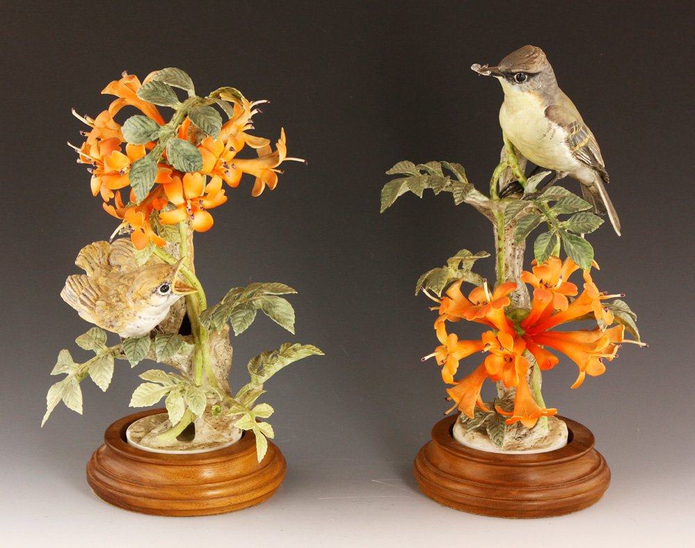 Pair of Royal Worcester Phoebe Sayornis Phoebe: Pair of Royal Worcester birds "Phoebe Sayornis Phoebe and Flame Vines," porcelain, modelled by Dorothy Doughty, tallest 11" h (excluding base). Provenance: From a CA estate.