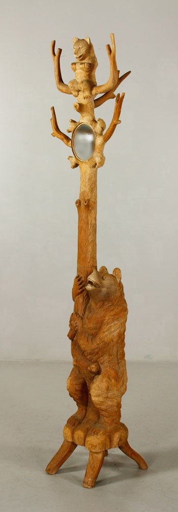 Black Forest Style Hall Tree: Black Forest style hall tree, carved with large bear at base and small bear at top, 72" h x 19" dia. Provenance: From a California collection.