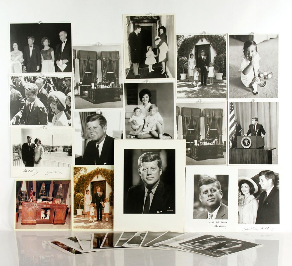 52 Kennedy Photographs: Lot of fifty-two color and black and white photographs of John F. Kennedy and family, some bearing stamps of Cecil Stoughton, The White House. Provenance: From a Connecticut estate. Purchased from the