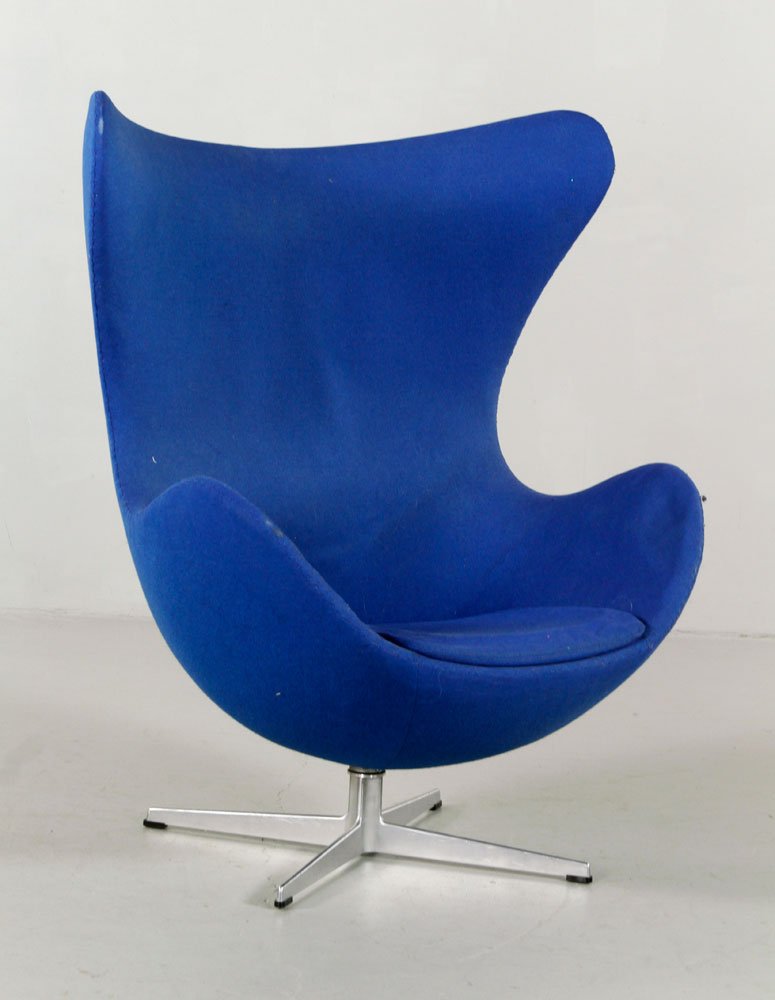Hansen by Jacobsen Egg Chair: Fritz Hansen designed by Arne Jacobsen egg chair, with original tag and upholstery, aluminum base, 42" x 34" x 27". Provenance: From a MA estate.