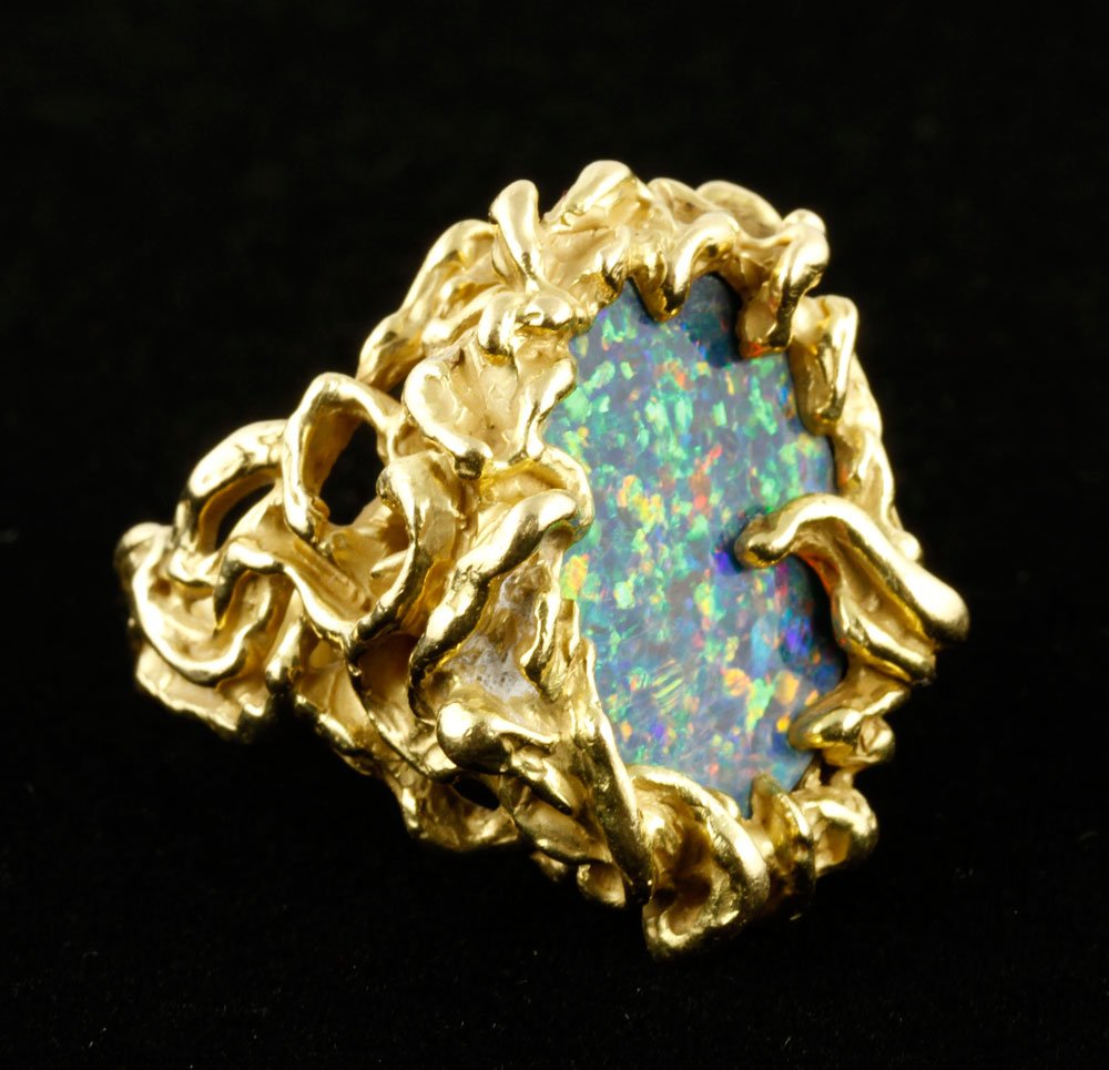 18K Gold Ring: 18K gold ring with semi-precious stone, marked King, 18K, organic design, opal doublet stone, size 7 1/2, approximately 33 grams TW. Provenance: From a MA estate.