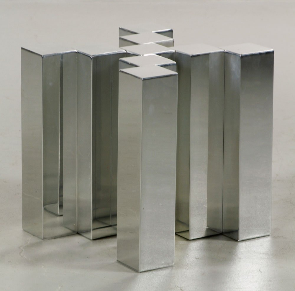 Style of Evans Coffee Table Base: Modernist coffee table base in the style of Paul Evans, chrome joined cube with round tempered glass, 14" x 19" x 13". Provenance: From a NH estate.