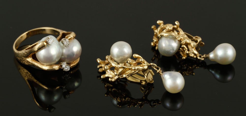 Pair of 14K Pearl Earrings with Matching Ring: Pair of 14K gold and pearl earrings with matching 14K gold ring, approximately 21 g. TW, ring size 8 1/2. Provenance: From the Estate of Mary L. Alchian, Palm Springs, CA.