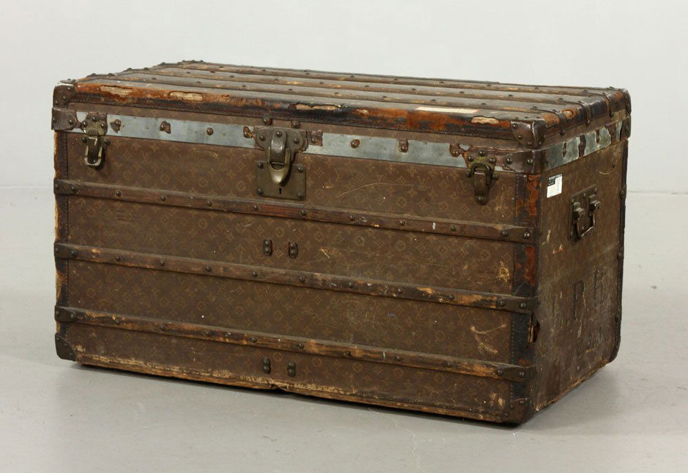 Louis Vuitton Steamer Trunk: Louis Vuitton steamer trunk, Monogram pattern, serial number 130308, 22" h x 22" w x 38" d. Provenance: From a Massachusetts estate.