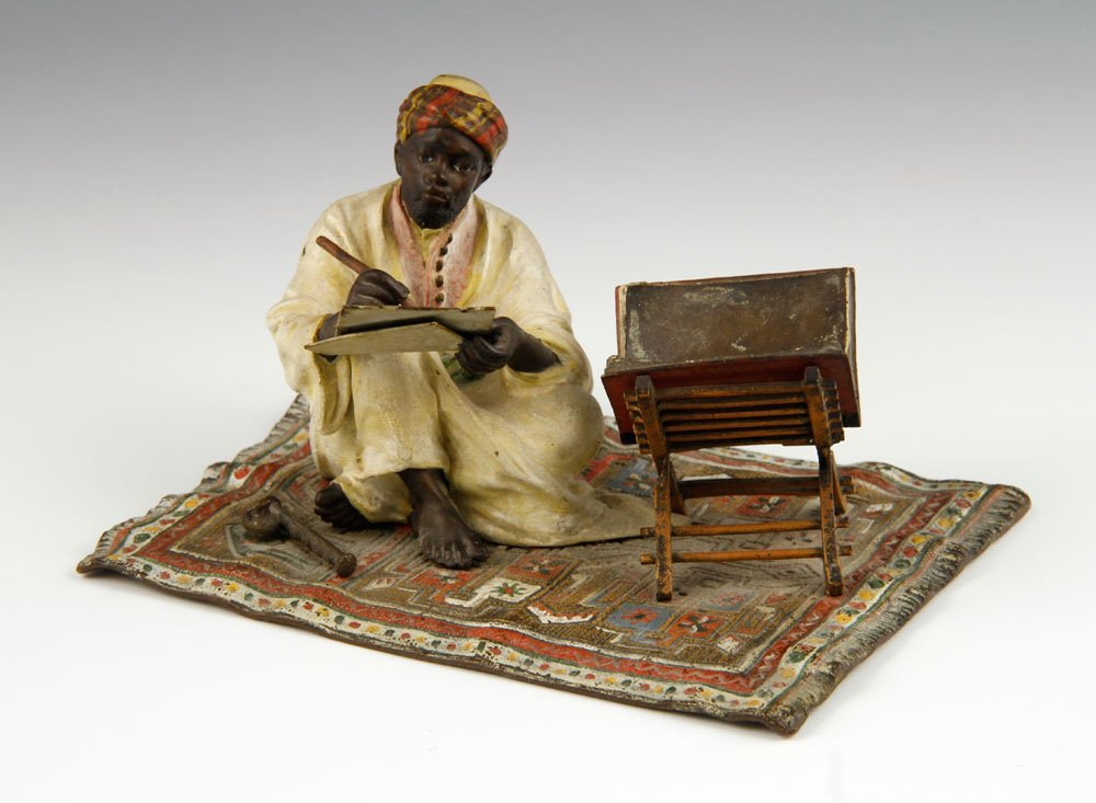 Franz Bergman Cold Painted Bronze Figure: Franz Bergman figure of an artist on a carpet, cold painted bronze, signed, 3" h x 5 3/4" w x 4" d. Provenance: From a Massachusetts estate.