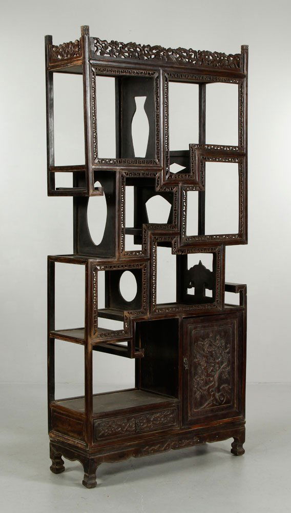 Chinese Large Hardwood Show Case: Large hardwood show case, China, geometrically designed tiers, carved with plum flowers and magpie birds in relief, with geometric openwork , 81" h x 37 1/2" l x 13 1/2" w.