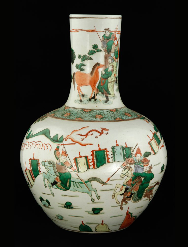 Chinese 19th C. Large Famille Verte Bottle Vase: Large famille verte bottle vase, China, 19th century, decorated with battling scenes on body and neck, brown line near the rim, with red flowers on turquois ground around shoulder, 21" h.