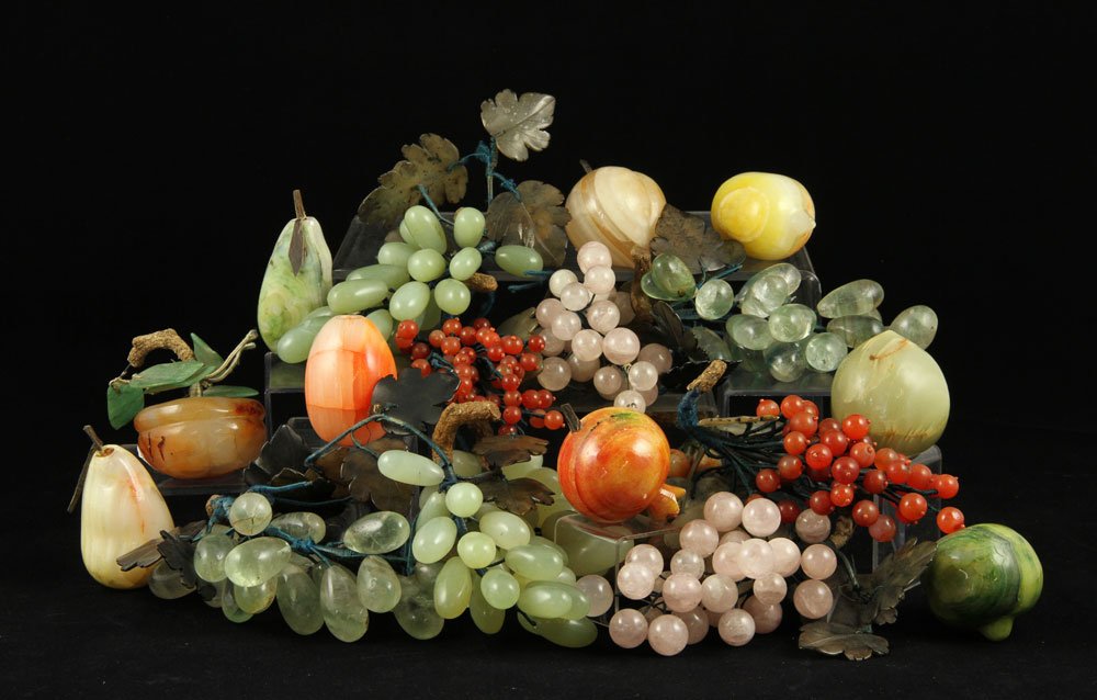 Lot of Chinese Stone Fruit: Lot of carved fruits, China, carnelian, jade and pink quartz, largest 7".
