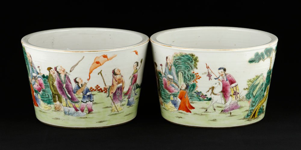 Pr. Chinese Famille Rose Flower Pots: Pair of famille rose flower pots, China, round shape, gilt on rim, decorated with eight deities in mountains as well as red bats and pine trees, 5 1/4" h x 8 1/4" w.