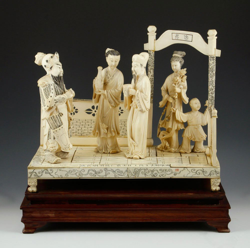 19th C. Figural Group: Figural group, late 19th century, depicting man and boy with Immortal and two other figures under archway, on wood stand, 12" h x 14 1/2" w x 9" d.