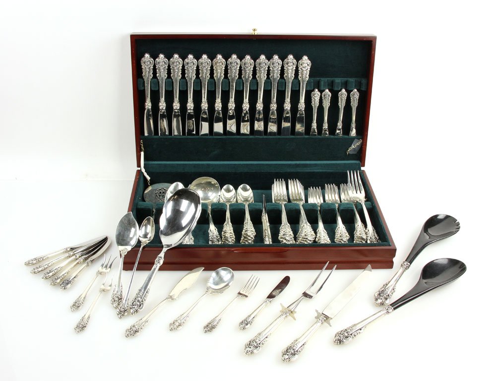 Wallace "Grande Baroque" Sterling Flatware Set: Wallace "Grand Baroque" sterling flatware set, to include: one child's fork and spoon set; twelve dinner forks; twelve butter knives; one butter knife server; one cake server; one cake knife; one crea