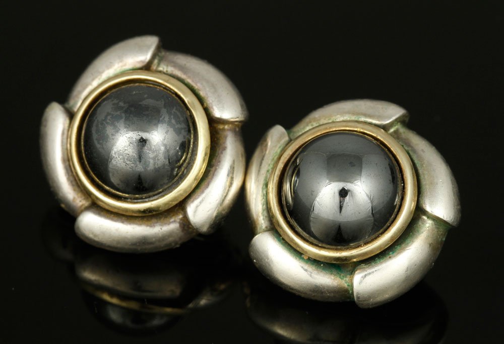 Pr Tiffany & Co Sterling and 18K Gold Earrings: Pair of Tiffany & Co earrings, 18K yellow gold, sterling, and hematite, 7/8"dia, approximately 0.7 troy oz TW. Provenance: MA estate.