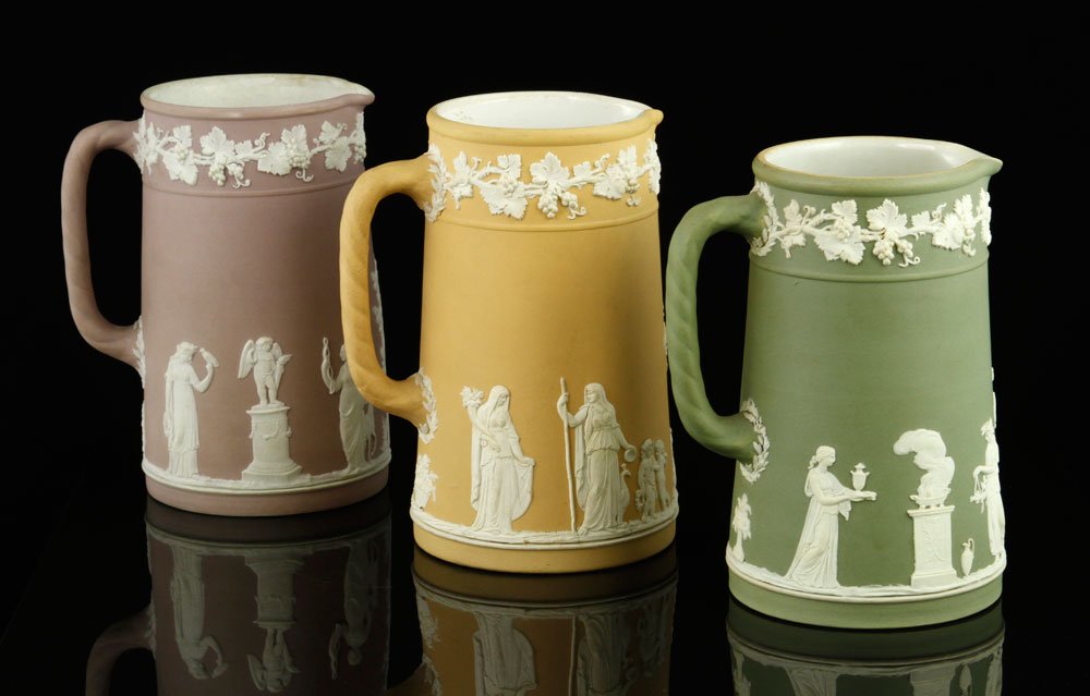 3 Wedgwood Jasperware Pitchers: Lot of three Wedgwood Jasperware pitchers in assorted colors, 6 1/2"h. Provenance: FL estate.
