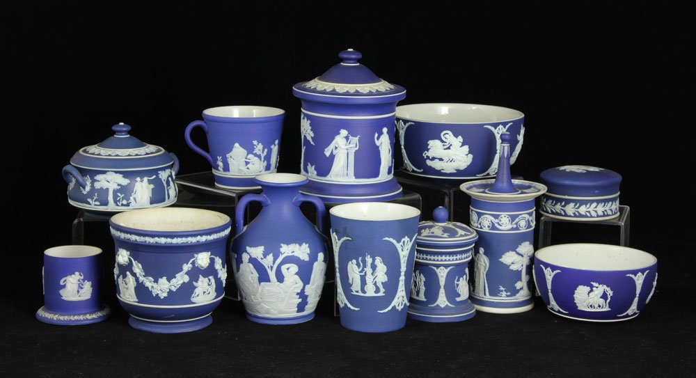 12 Wedgewood Jasperware Items: Lot of twelve blue and white Wedgwood Jasperware items, 6"h (tallest). Provenance: FL estate.