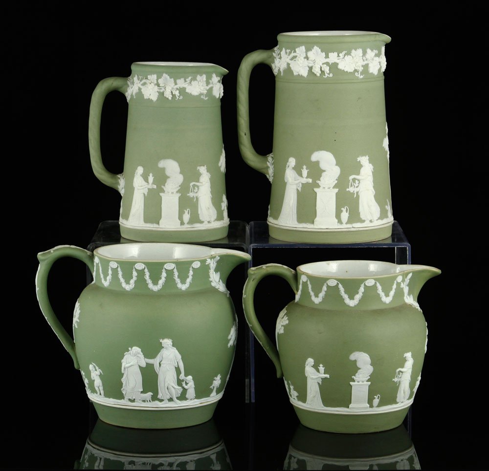 4 Wedgwood Jasperware Pitchers: Lot of four green and white Wedgwood Jasperware pitchers. Provenance: FL estate.