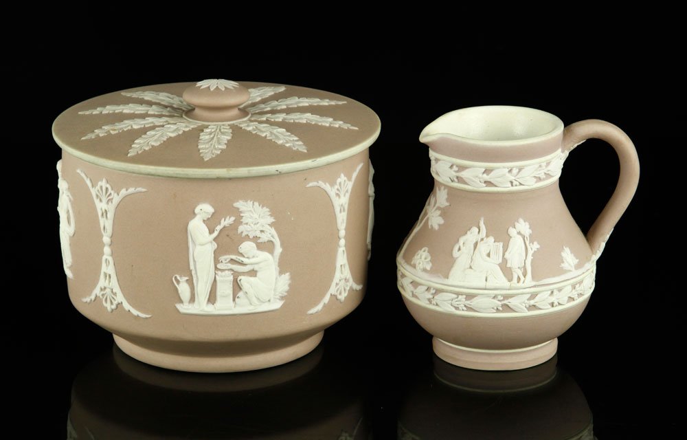 2 Pc. Lavender Wedgwood Jasperware: Two pieces of lavender colored Wedgwood Jasperware, including a creamer and covered bowl, 3 1/2" x 4 1/4" (bowl). Provenance: FL estate.
