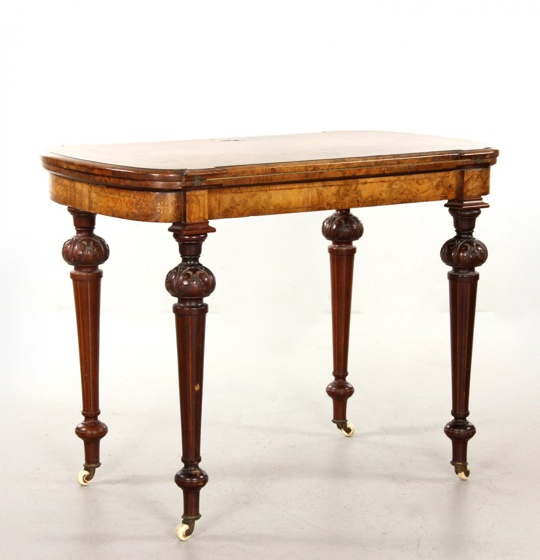 19th C. Edwardian Burl Wood Game Table: 19th century English Edwardian game table, veneered burl wood with marquetry, with full apron on tapered carved legs terminating in casters, opens to reveal green baize, 28 1/2" h x 37 1/2" w x 20" d 