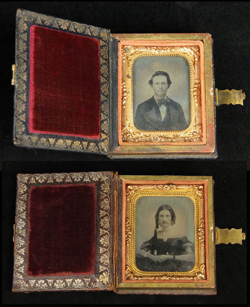 Two Early Photography Cases: Lot of two early photographs, portraits of a man and woman, case covers having profile of George Washington, both 1 3/4" h x 1 1/2" w (view), 3 1/4" h x 2 3/4" w (case). Provenance: From a Pennsylvani