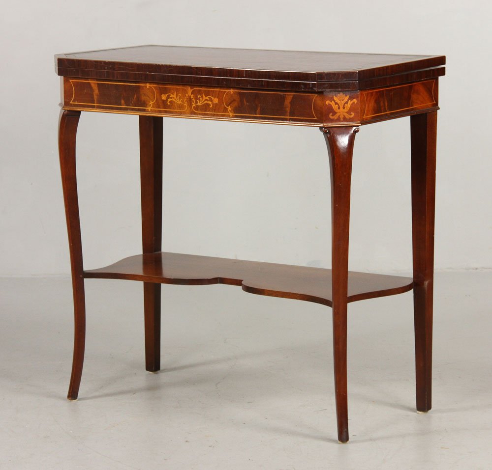 Early 20th C. French Mahogany Pier Table: Early 20th century French pier table, mahogany, with leather inlay and fruit wood marquetry in skirt, 31" h x 32" w x 16" d. Provenance: From a Massachusetts estate.